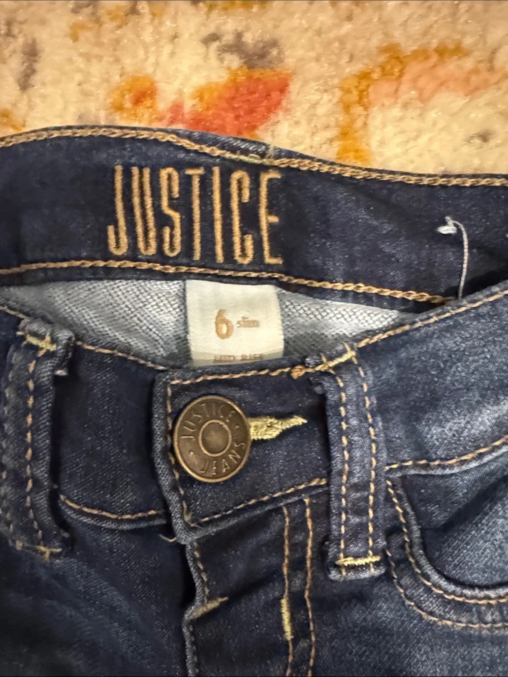 Justice Dark Indigo Skinny Jeans with Subtle Distressing
